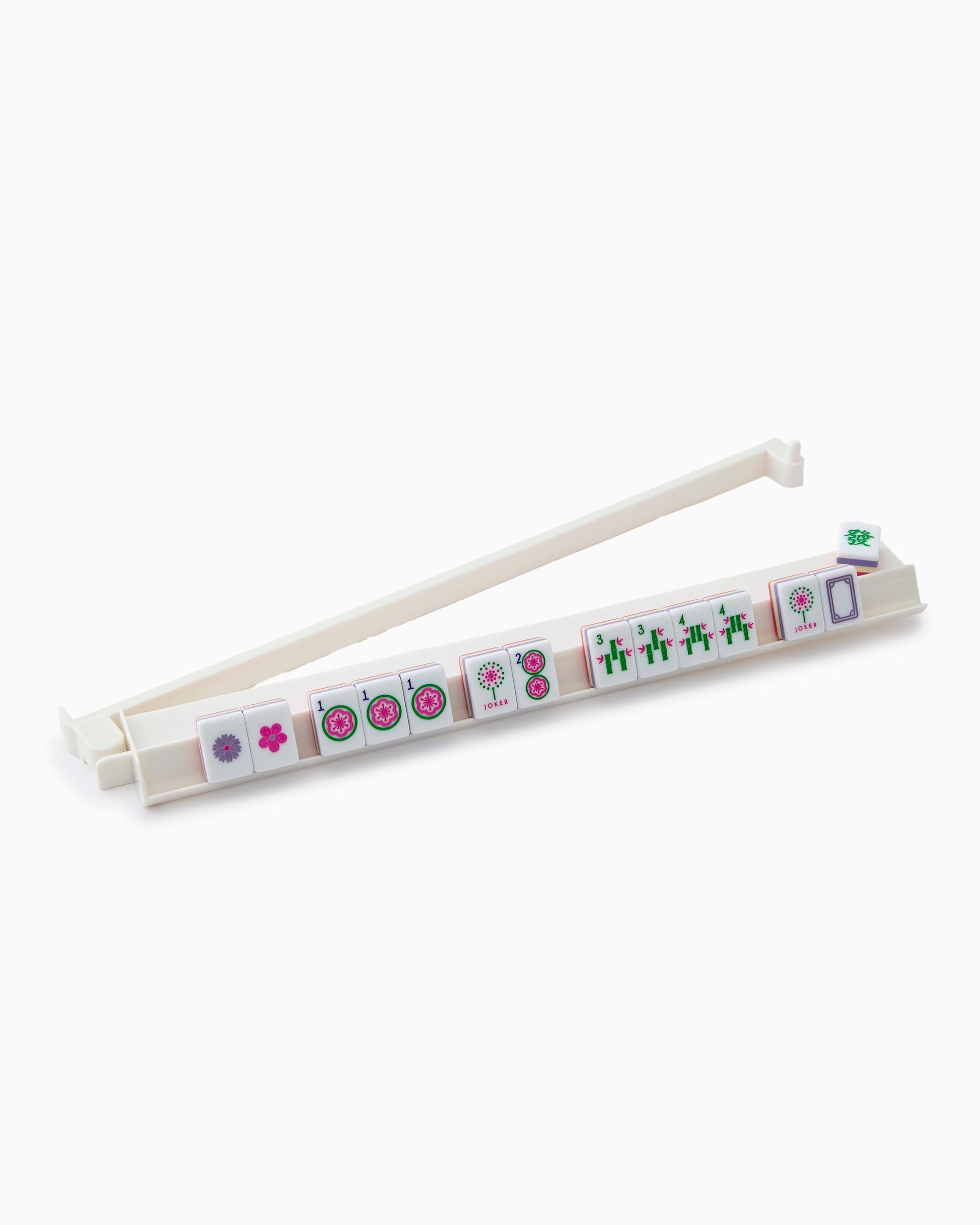 one rack pusher set with mahjong tiles on it