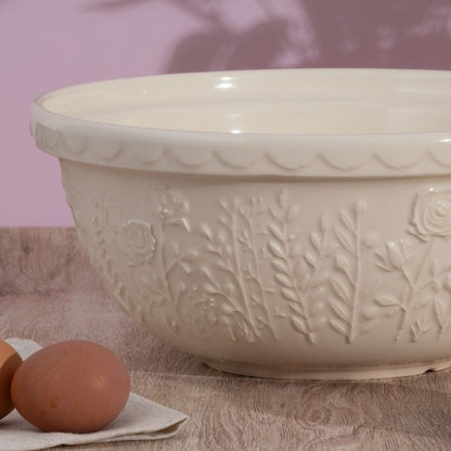 close-up of bowl on a counter with eggs set next to it.