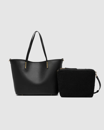 Black tote with matching pouch on a light gray background