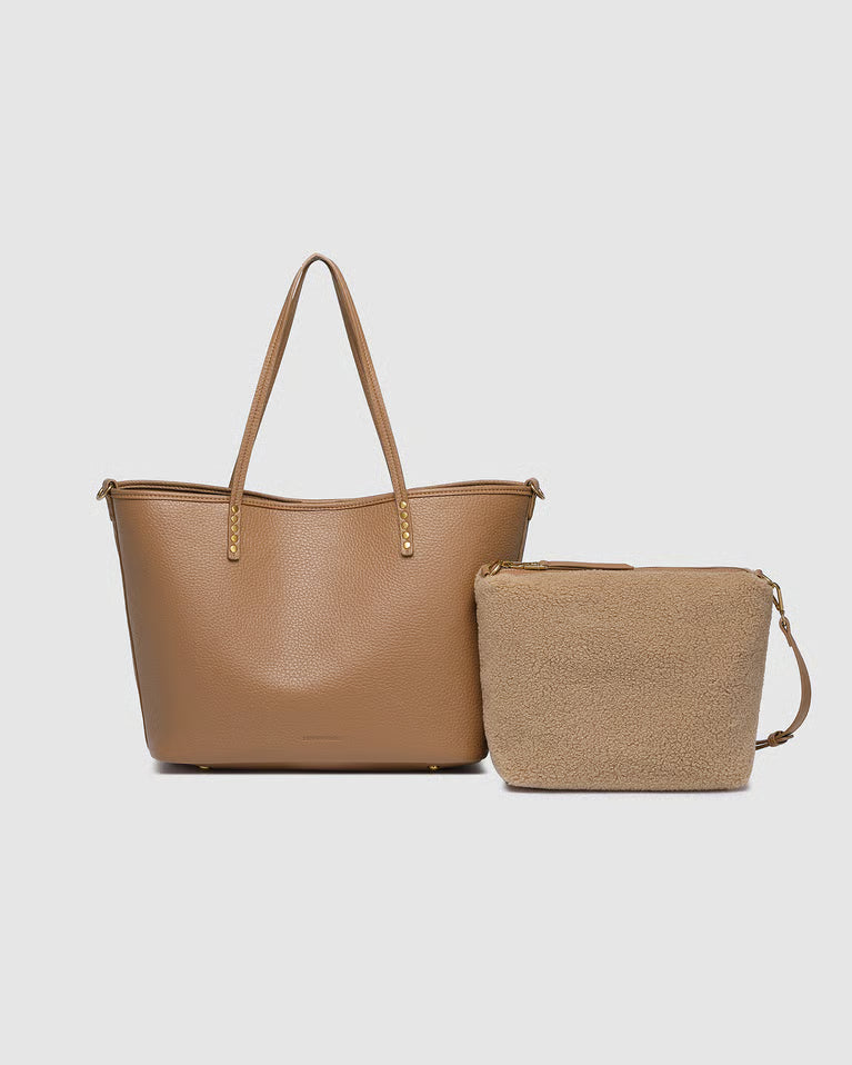 Brown leather tote and matching pouch on a light gray background