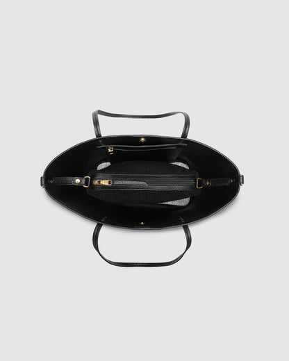 interior view of black tote bag showing small bag inside