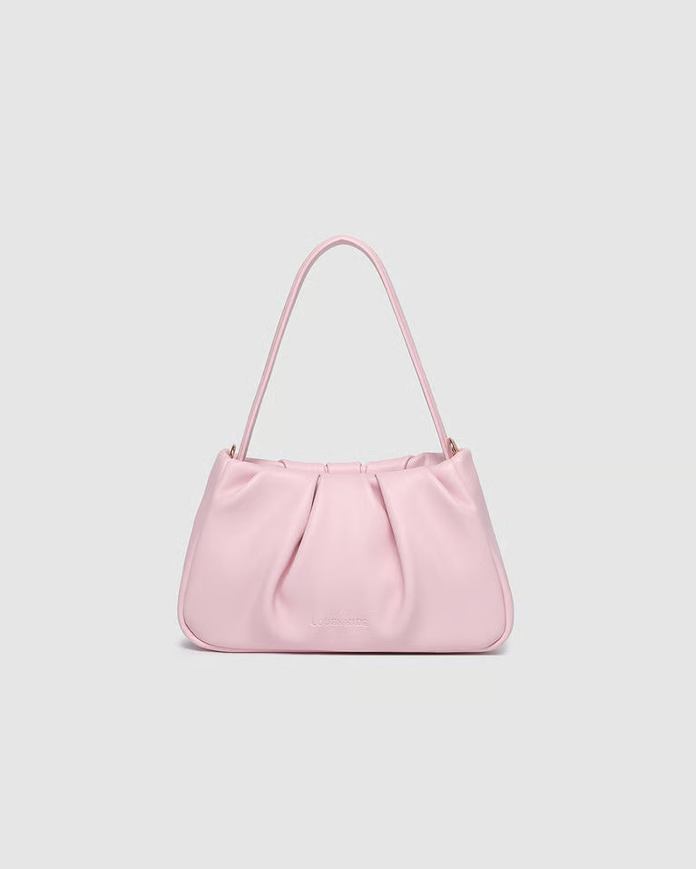 Pink handbag on a light gray background