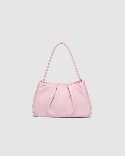 Pink handbag on a light gray background