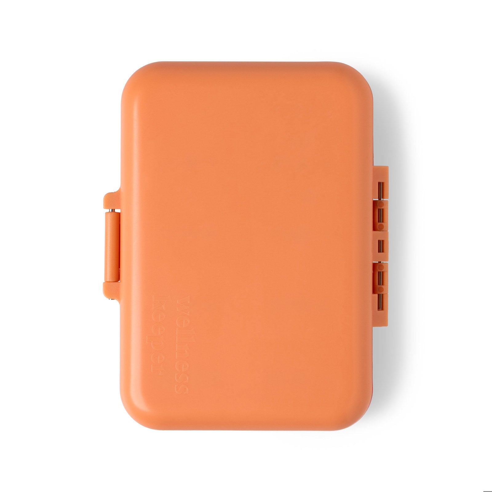 orange Light-Up Pill And Vitamin Case closed and shown on a white background
