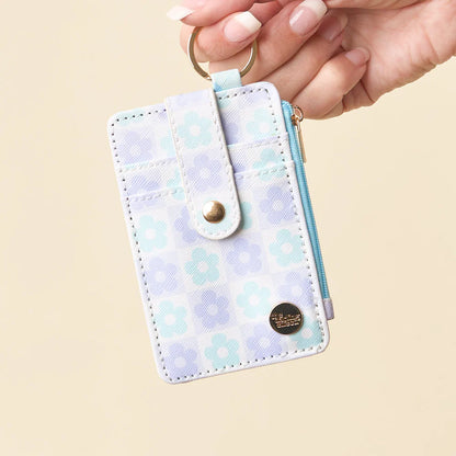 hand holding blue Flower Check Keychain Card Wallet by the keyring.