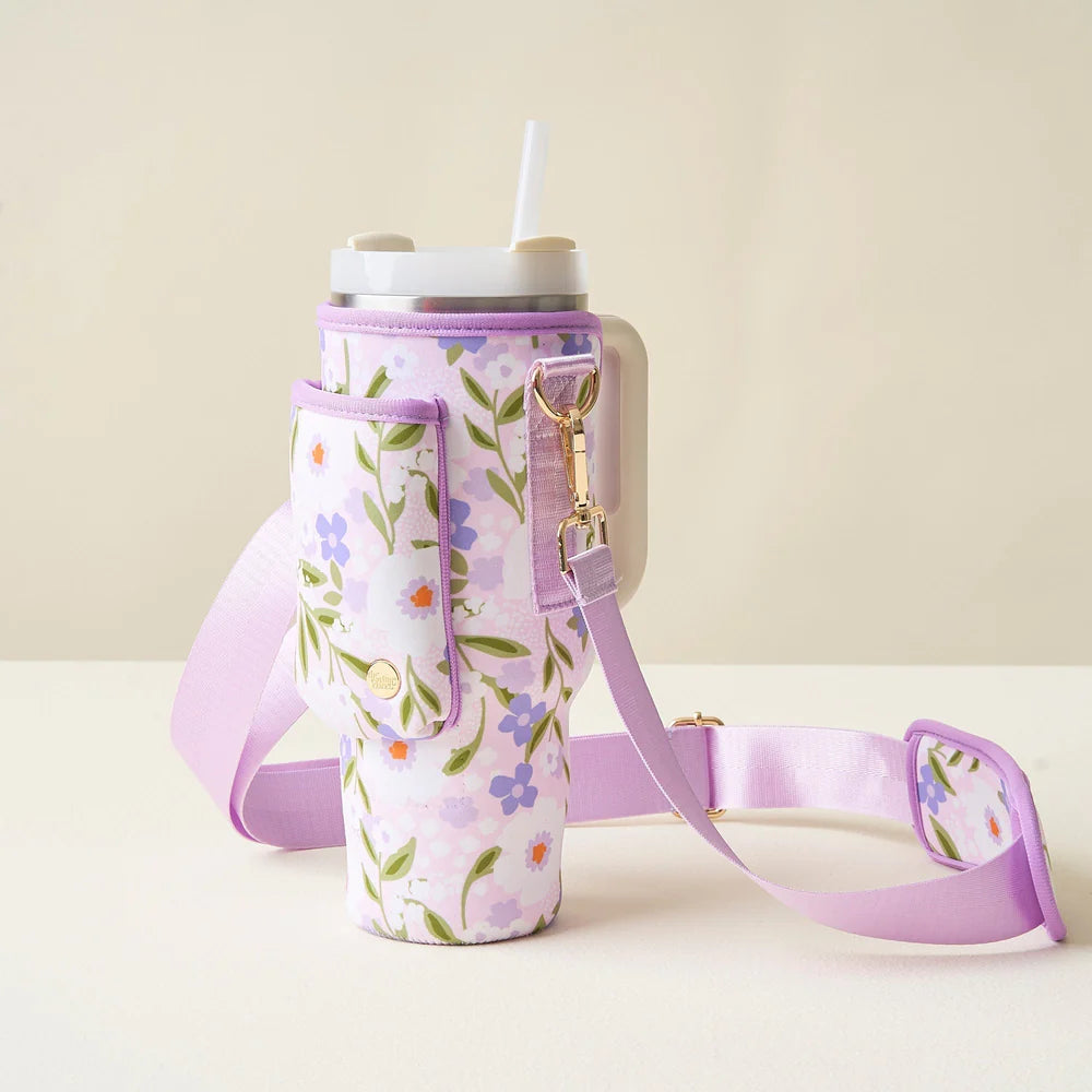 floral haven lilac tumbler sling set on an off-white table.