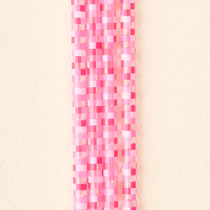 close-up of 4 pink check straws.