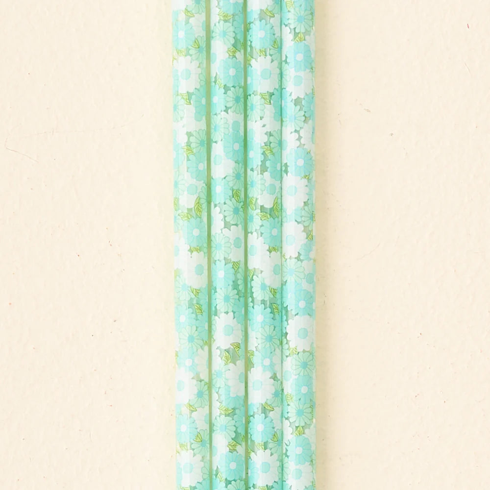 close-up of 4 blue daisy craze straws.