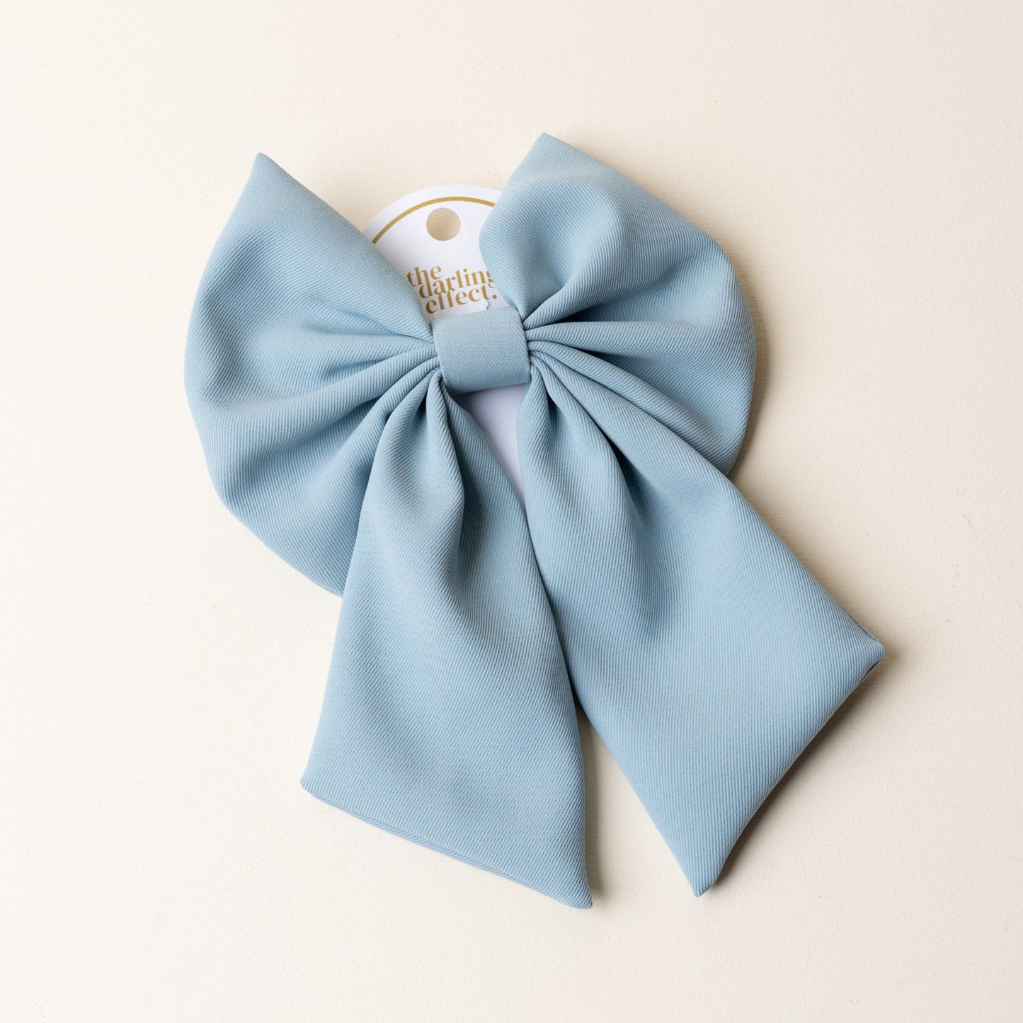 light blue hair bow.