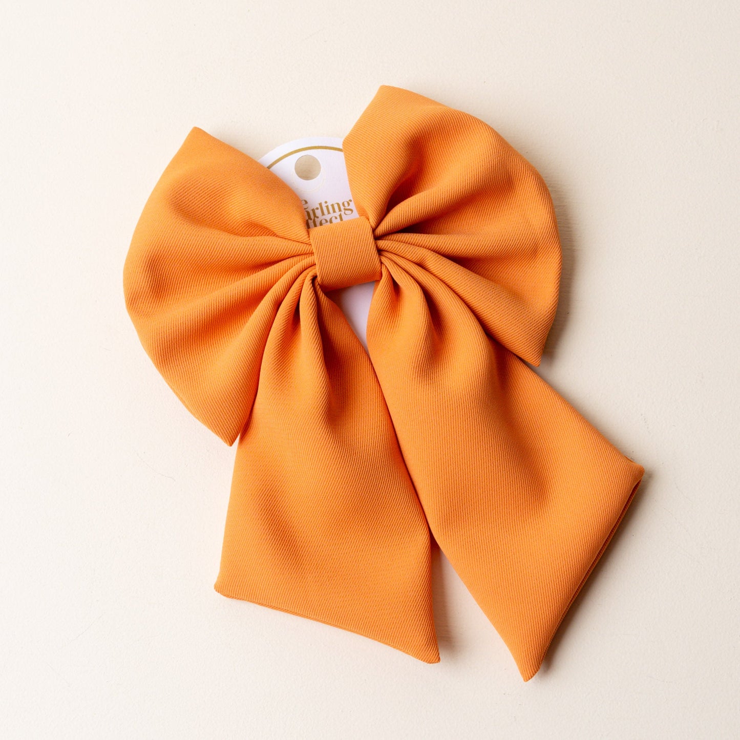 orange hair bow.