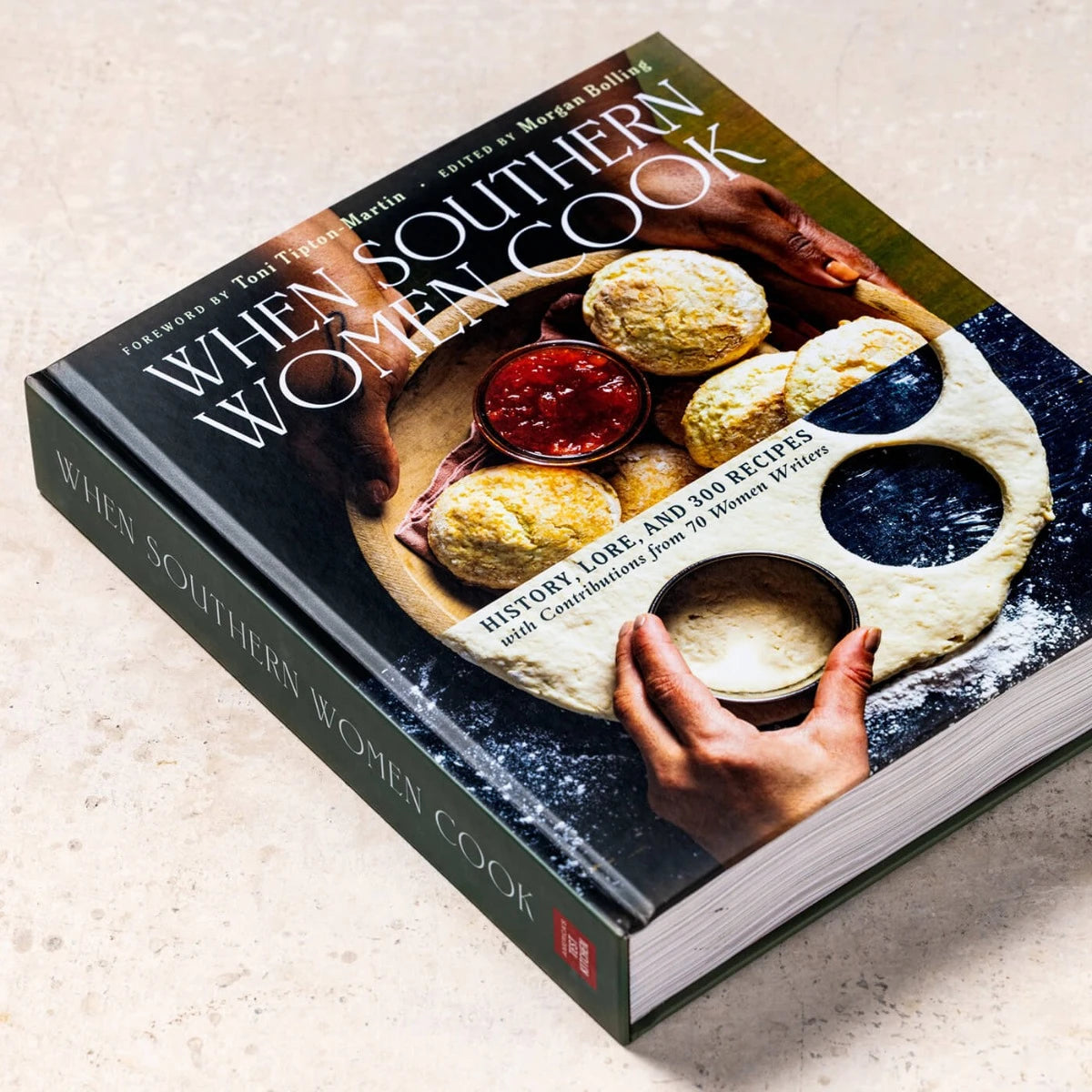 When Southern Women Cook book laying on a stone surface