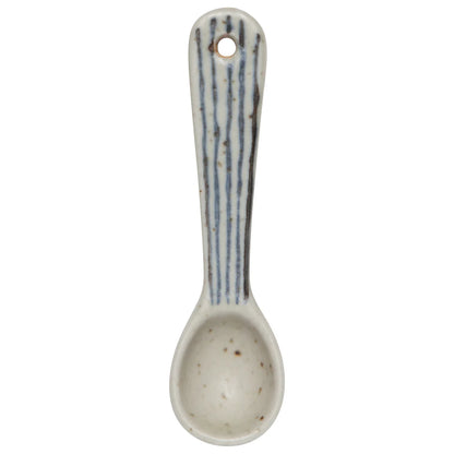 ceramic spoon with blue lines pattern