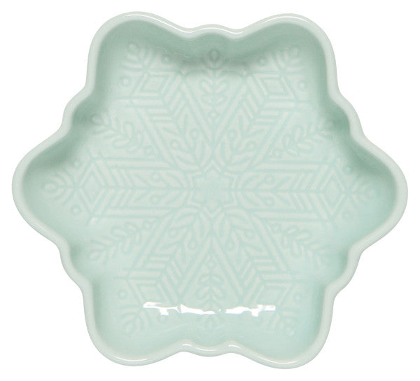 mint colored ceramic dish shaped like a snowflake with a snowflake design on the interior.