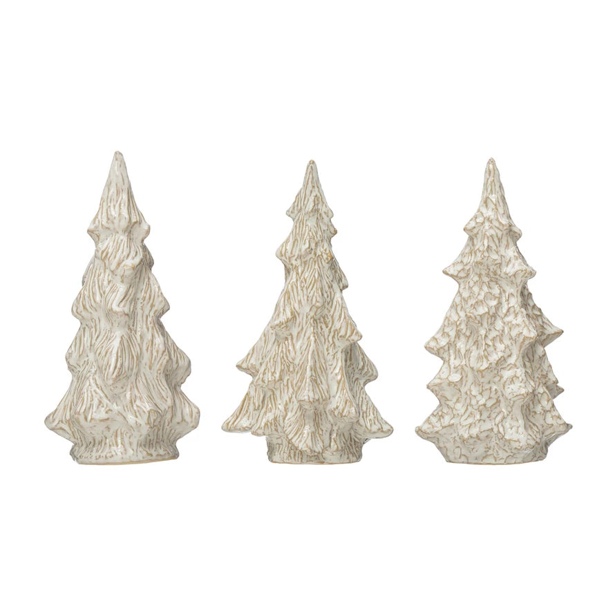 3 styles and shapes of stoneware trees in a row on a white background.