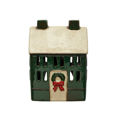 green with white roof hand painted stoneware house displayed against a white background