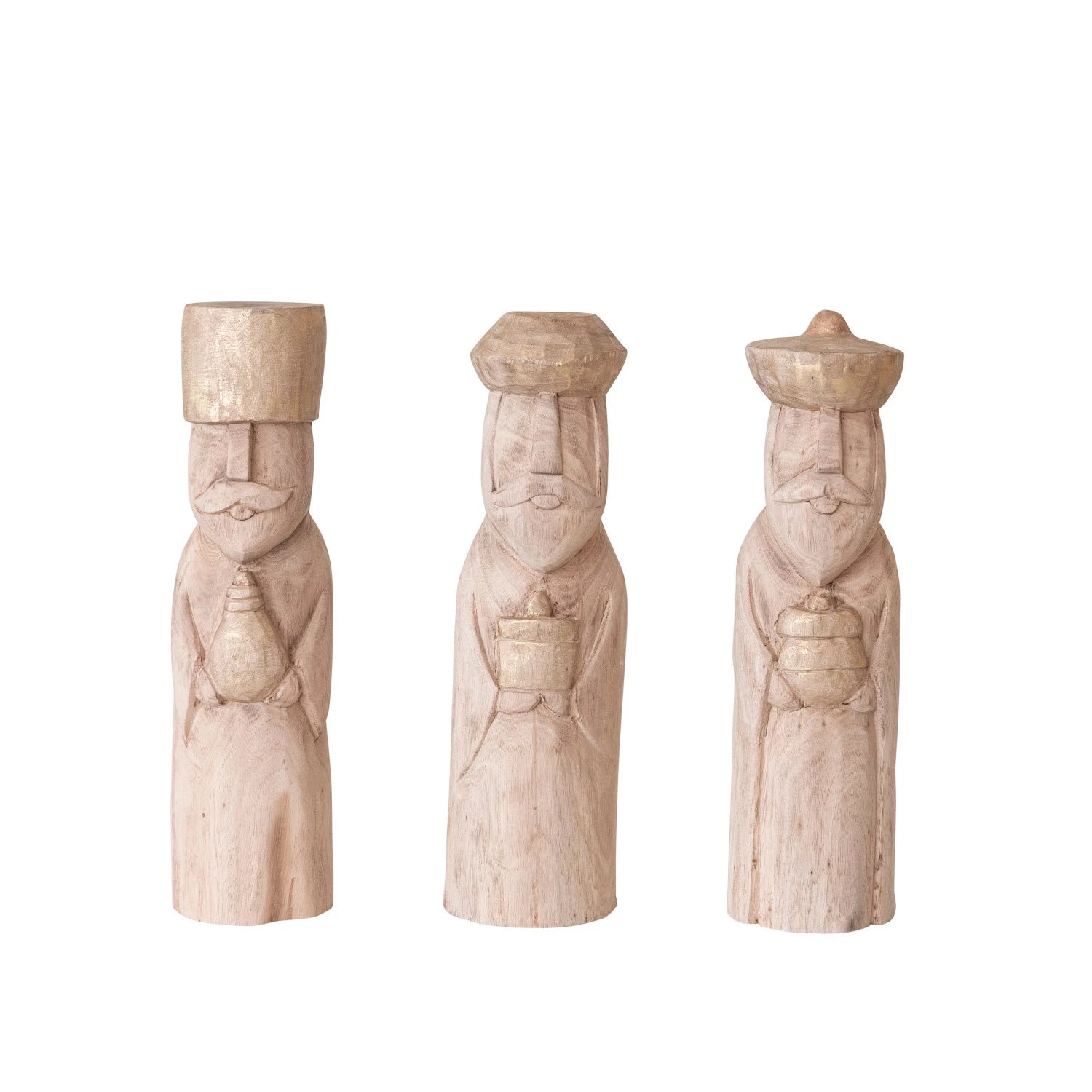 3 assorted wisemen carved from mango wood in a row on a white background.