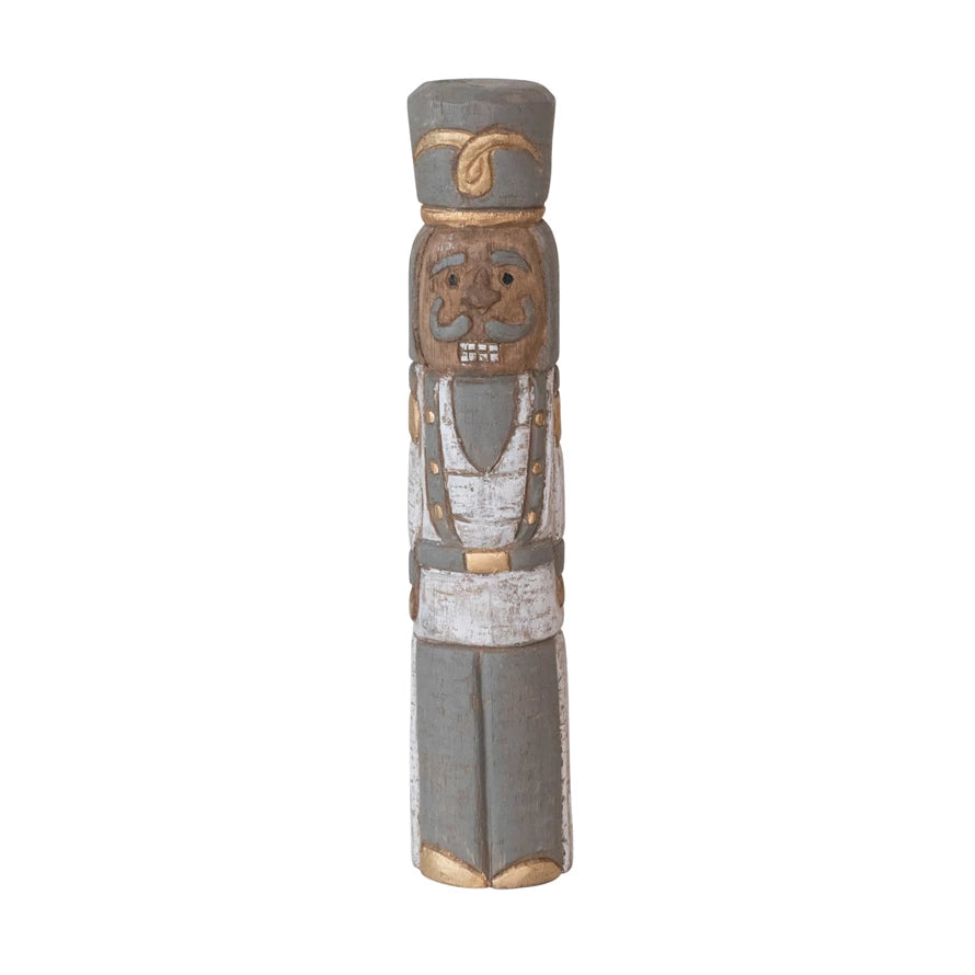 Small mango wood nutcracker with white and gray uniform and gray and gold hat.