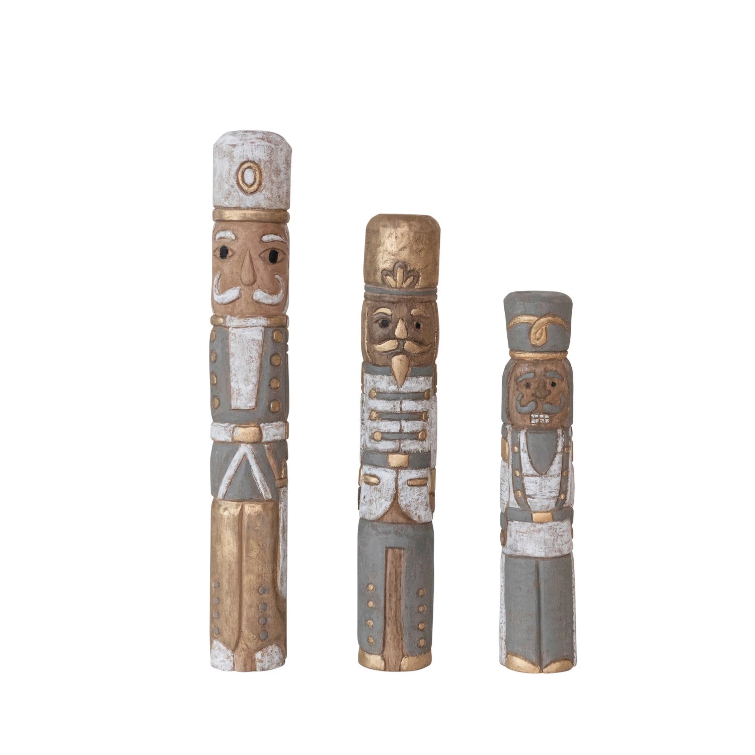 Three styles of mango wood nutcrackers in a row on a white background.