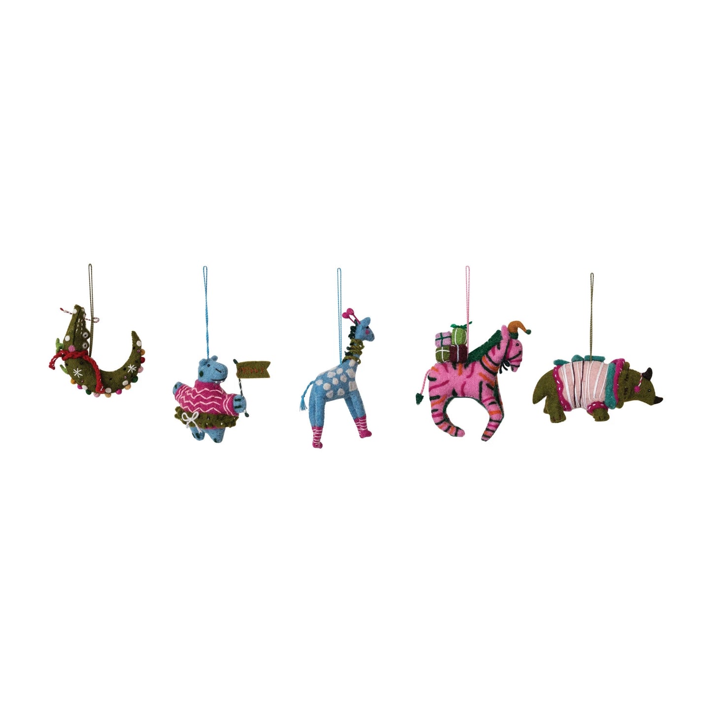 assorted animal ornaments in a row on a white background.