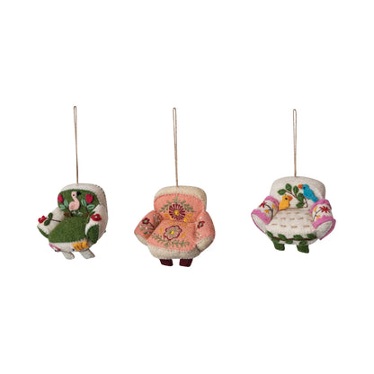 embroidered felt chair ornaments in a row on a white background.