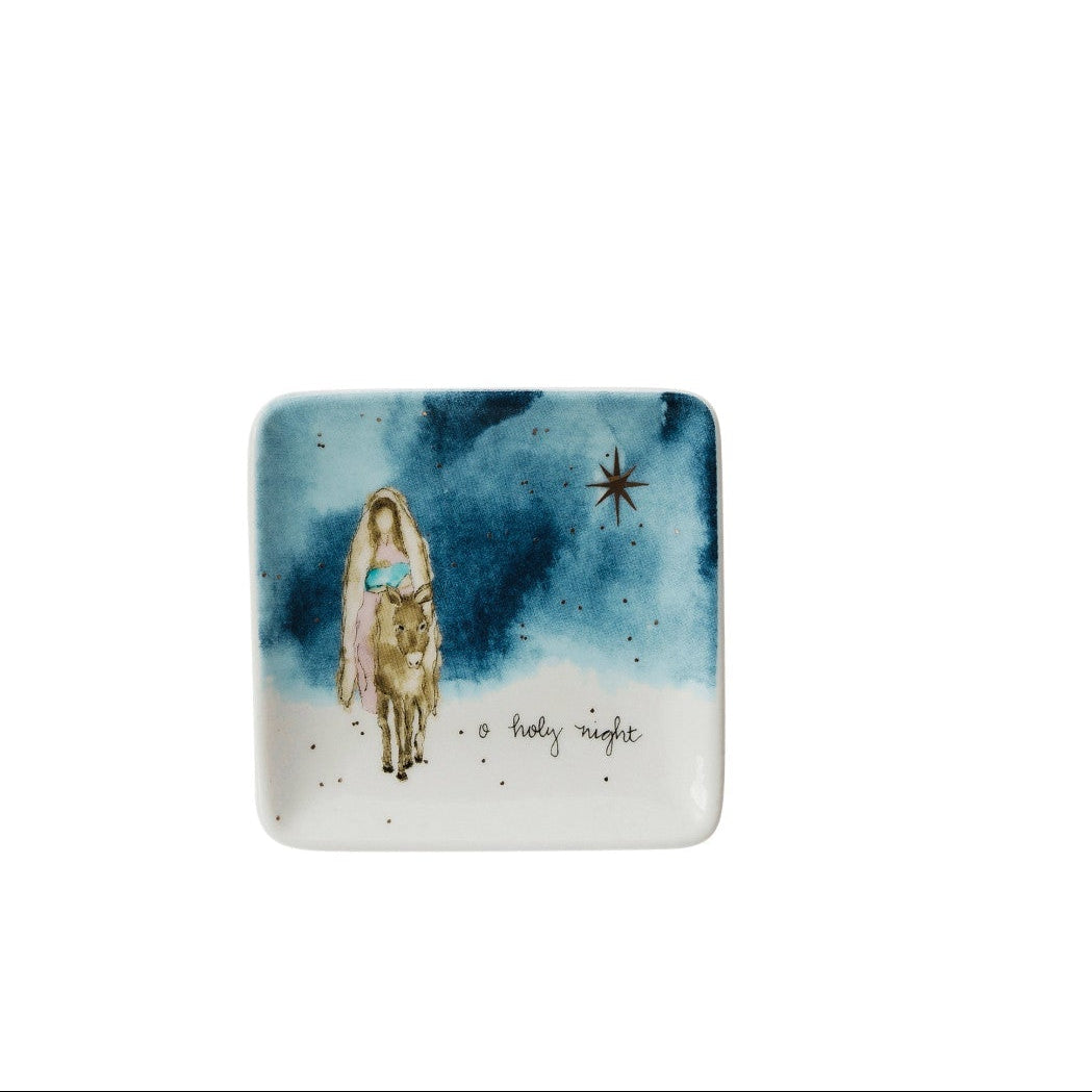 small square dish with blue background and image of a mary riding a donkey with a star above and text "o holy night" printed on it