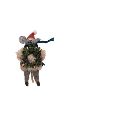 felt mouse ornament wearing a cream sweater, green scarf, and red hat and holding a holiday wreath