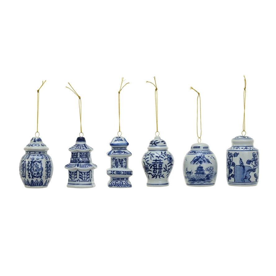 Six assorted Ginger jar ornaments in a row on a white background.