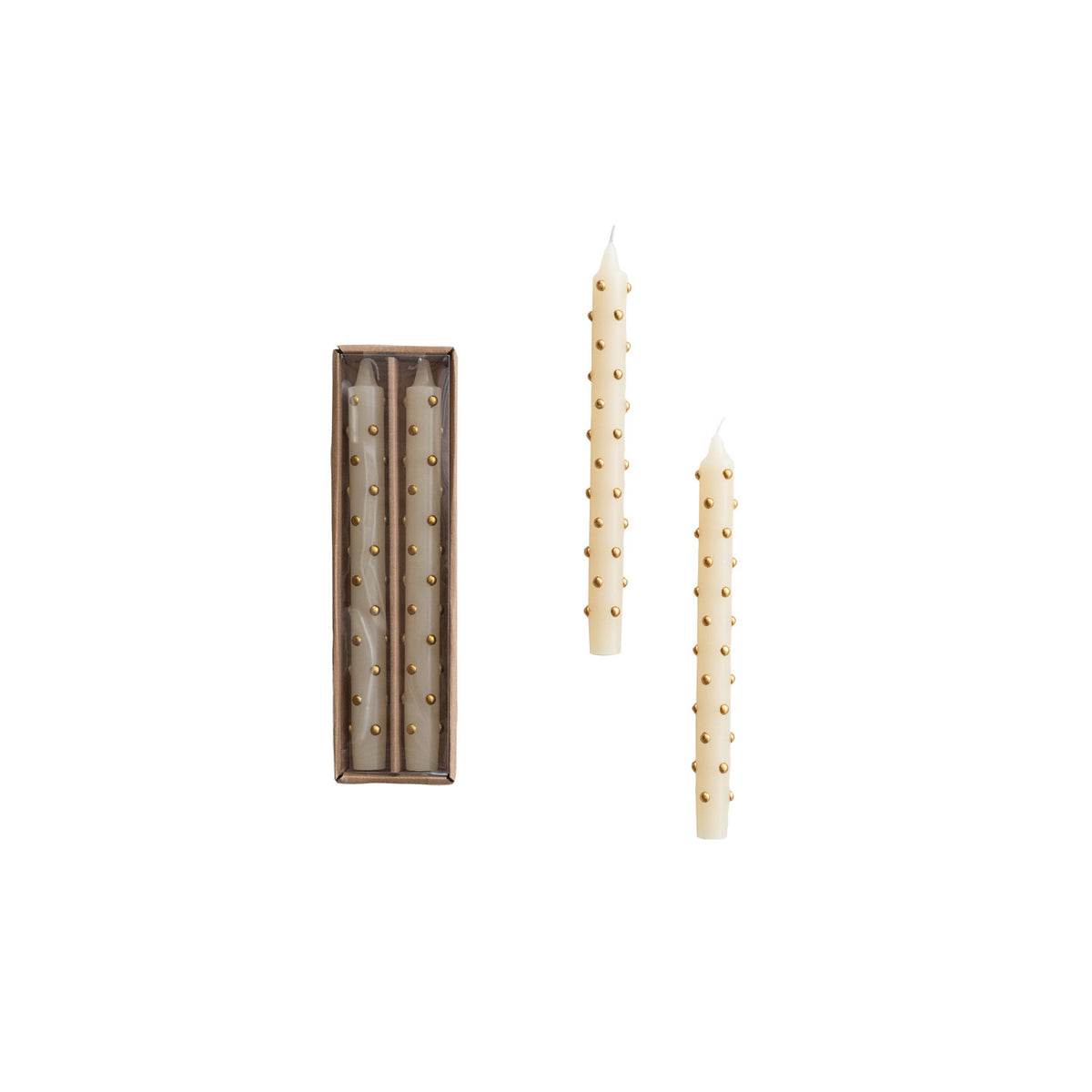 box set of ivory candles with 3d gold dots on them next to 2 candles out of their box on a white background