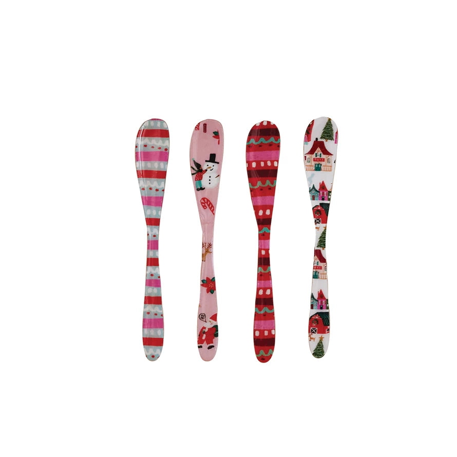 Enameled spreaders with assorted North Pole Patterns