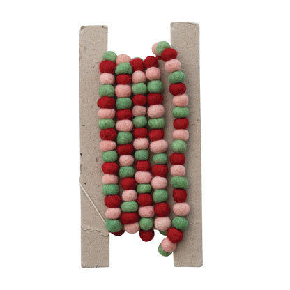 felt pom garland wrapped on card packaging