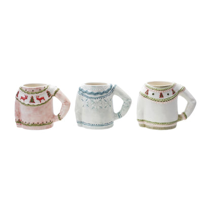Stoneware Sweater Shaped Mugs in a row on a white background