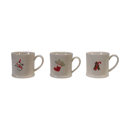Embossed Stoneware Holiday Mugs in a row on a white background