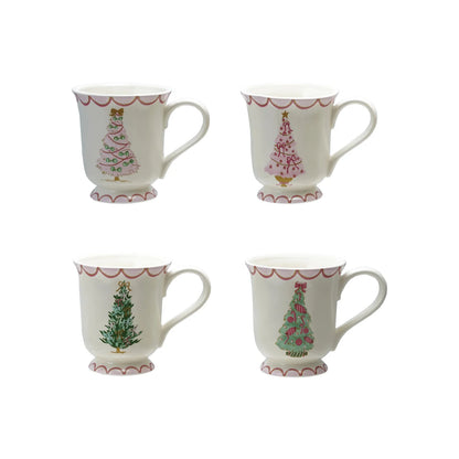 4 christmas tree mugs on a white background