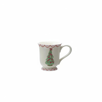 mug with green tree and candy on it