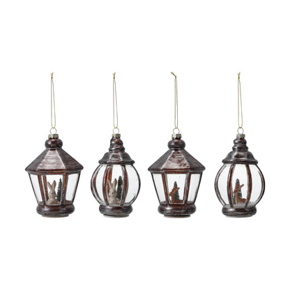 4 lantern ornaments in a row shown on a white background
