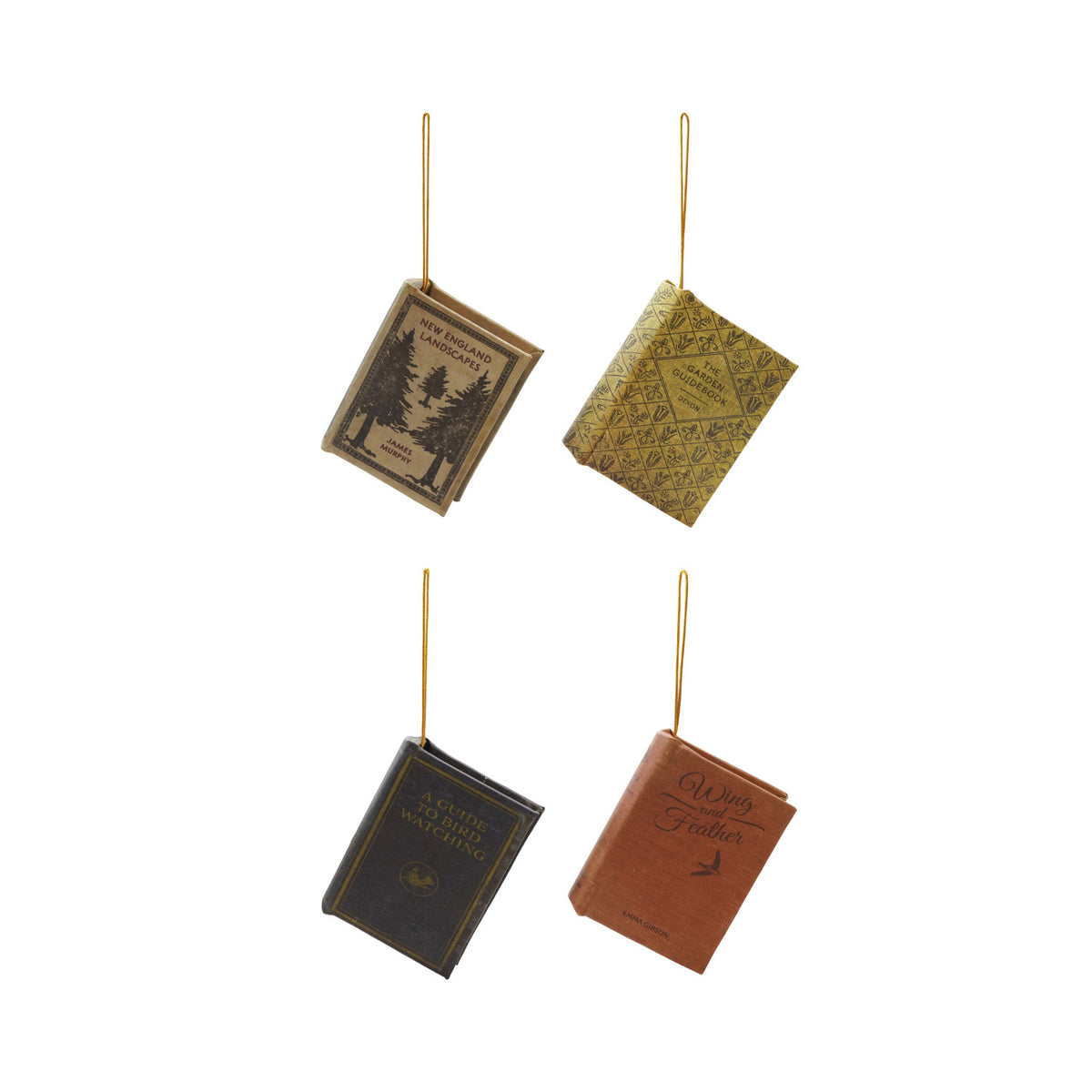 four book ornaments handing from their gold string on a white background