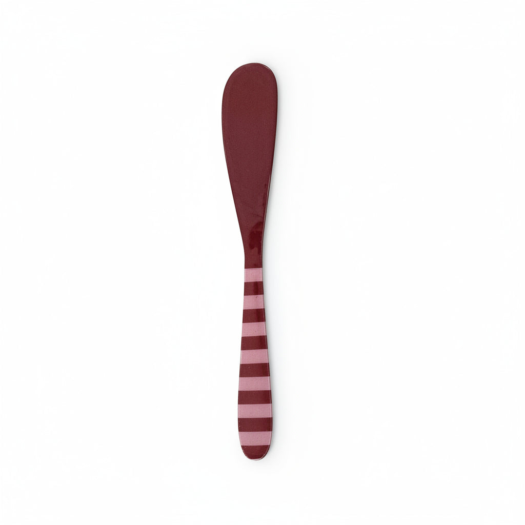 red and pink striped spreader