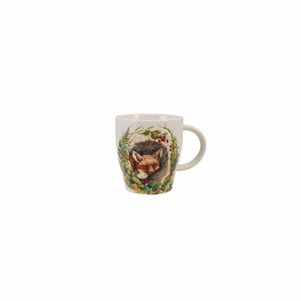 mug with image of a fox peeking out of lush greenery on it