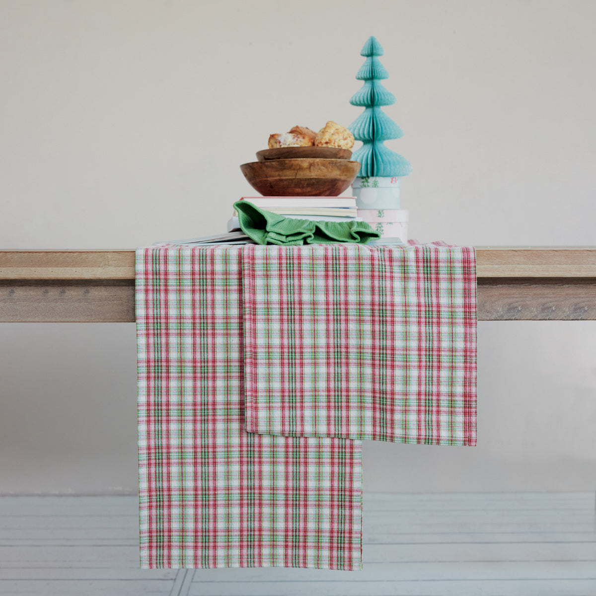 plaid pattern table runner decorating a table