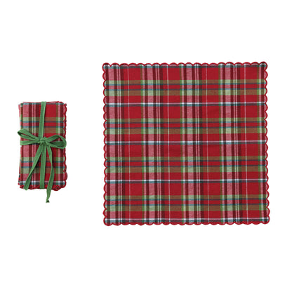 plaid tartan napkin set next to an unfolded napkin on a white background