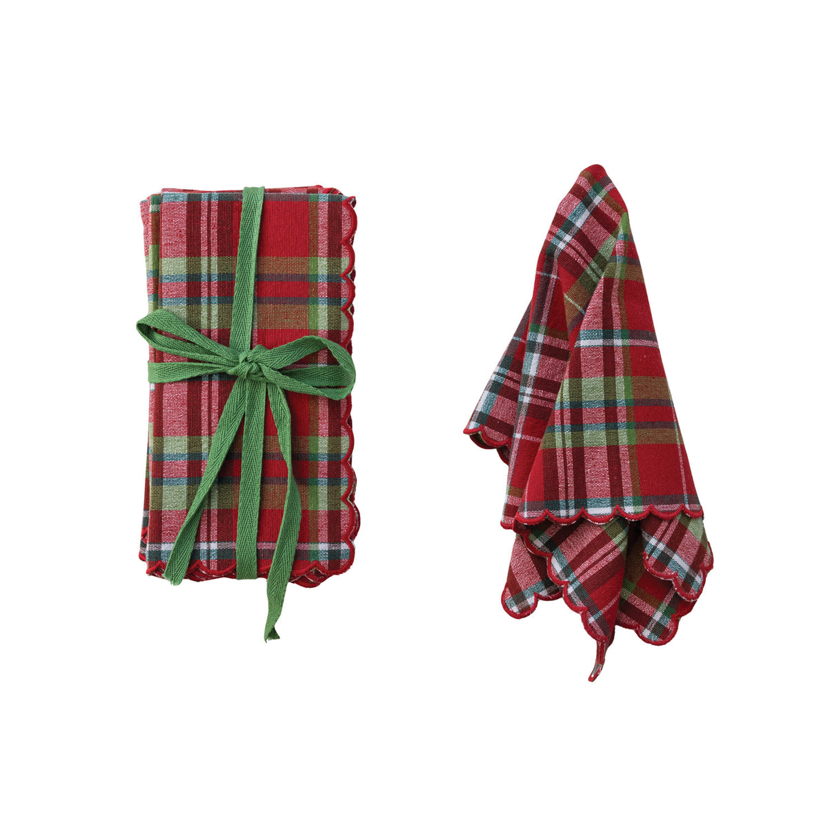 plaid tartan napkin set next to a slightly folded napkin