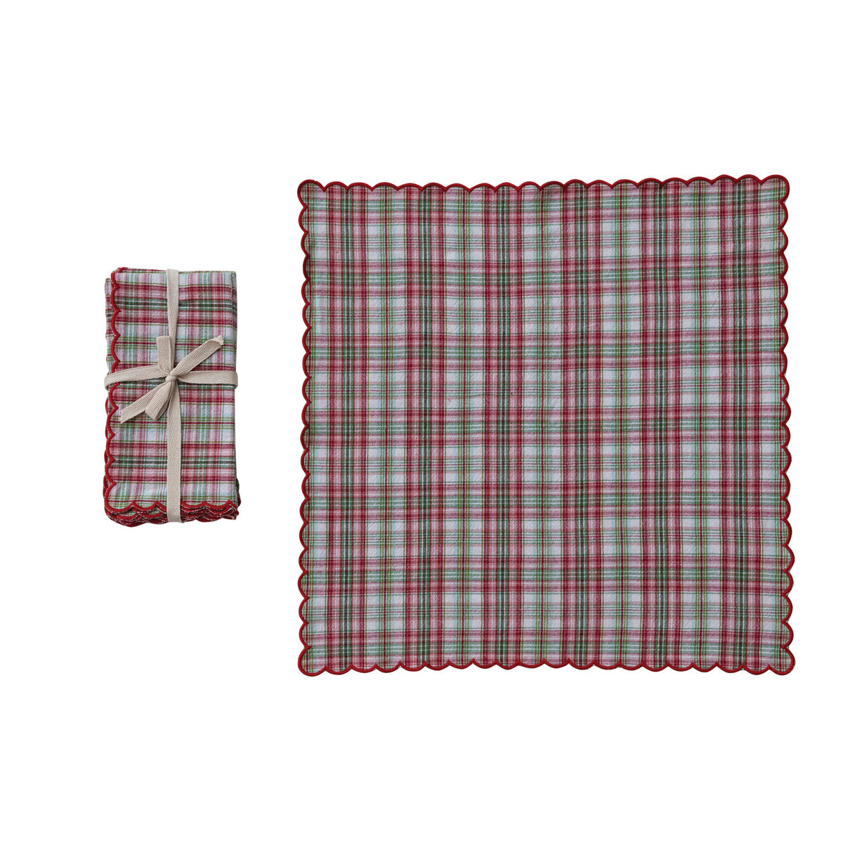set of napkins next to an unfolded napkin on a white background