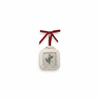 white square frame with pine in frame