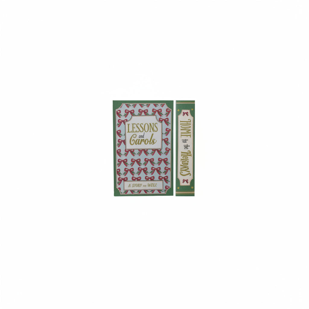 cover and spine views of green and blue book box titled lessons and carols with red bow and greenery design