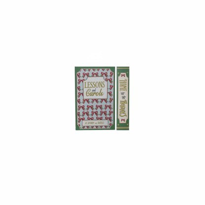 cover and spine views of green and blue book box titled lessons and carols with red bow and greenery design