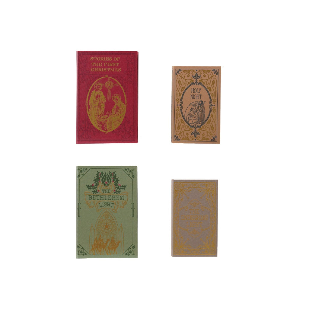 4 christmas themed book boxes on a white background