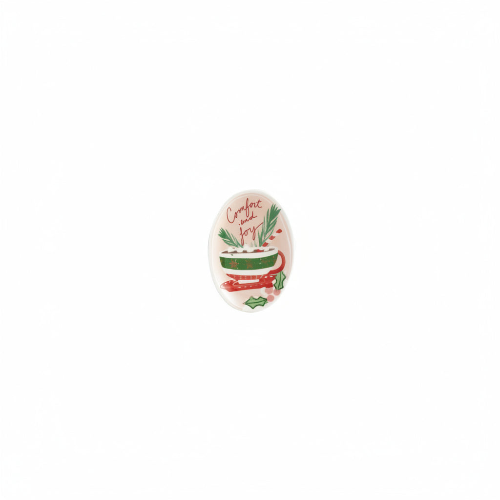 small oval dish with green and white mug and "comfort and joy" printed on it