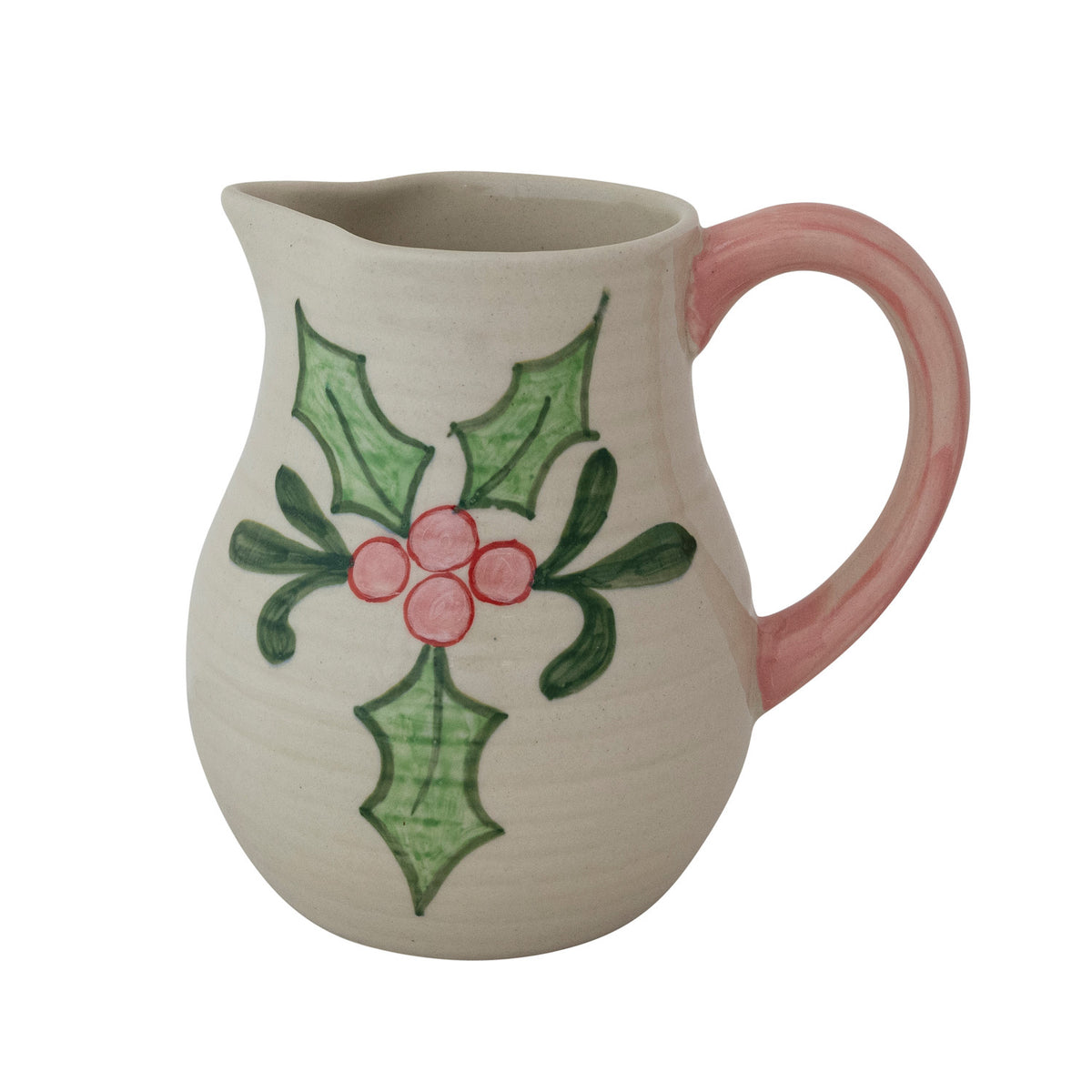 Ceramic pitcher with holly design on a white background