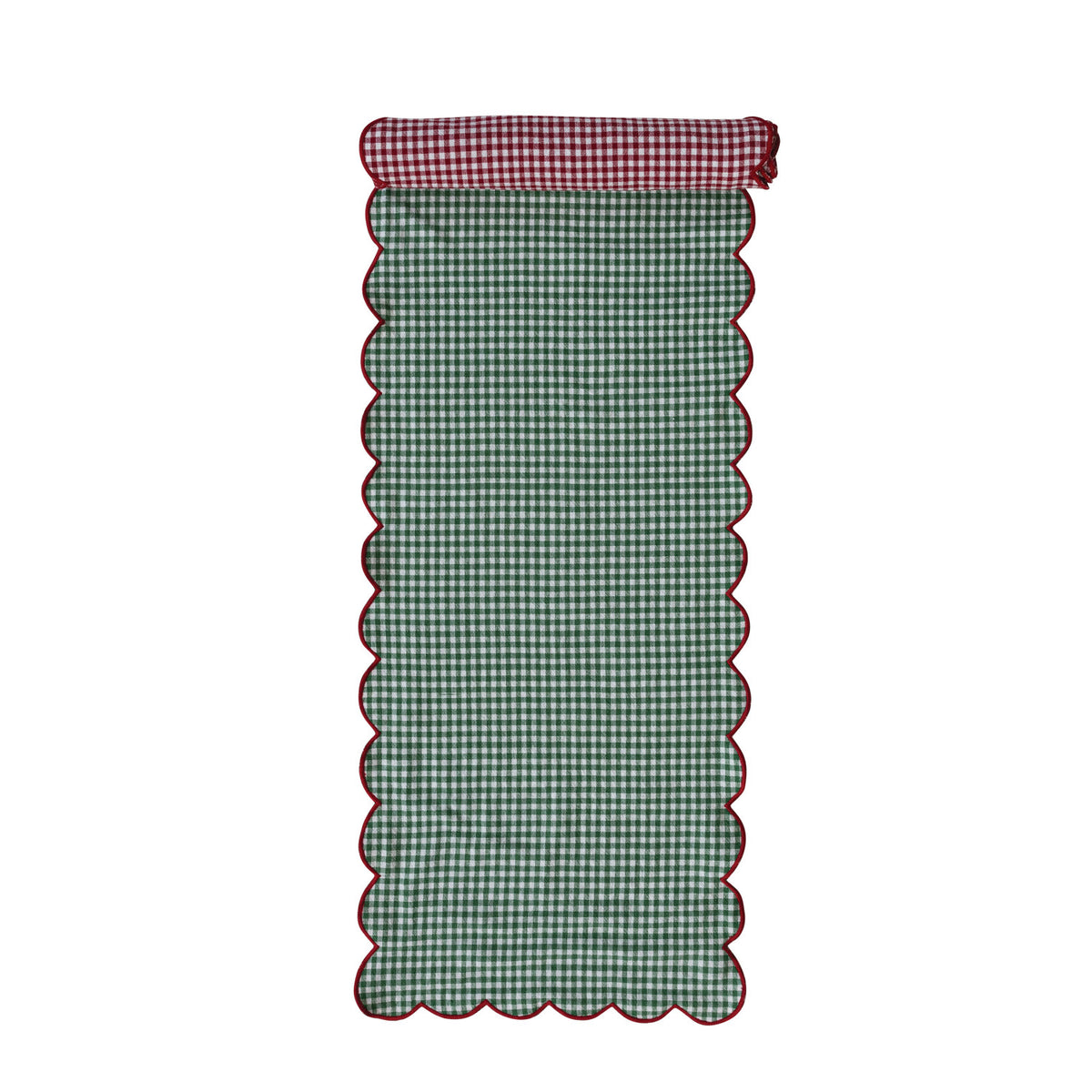 green side of the gingham table runner rolled slightly to show the red side