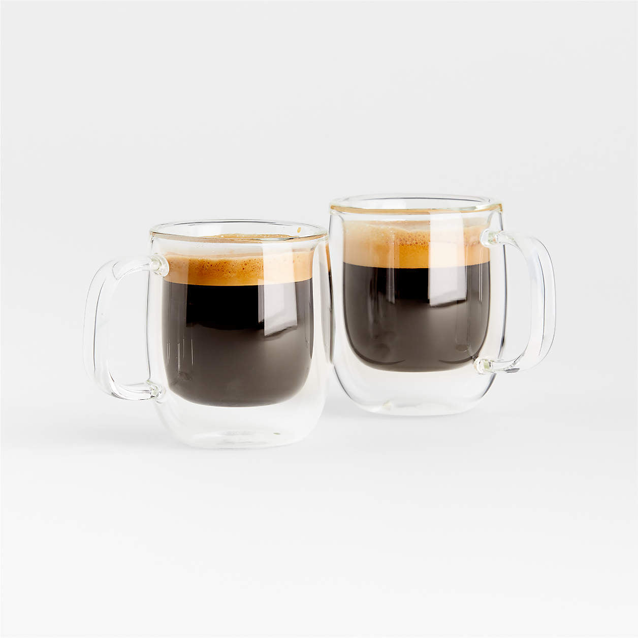 2 sorrento espresso mugs filled with espresso on a white background.